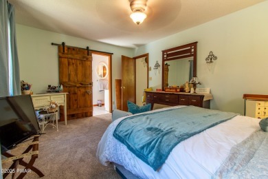 Wake up to the sounds of nature, unwind by the fire, and take in on The Hideout Golf in Pennsylvania - for sale on GolfHomes.com, golf home, golf lot