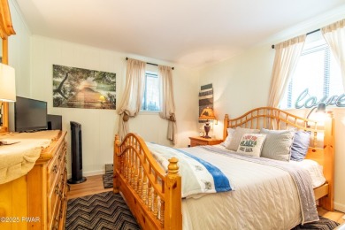 Wake up to the sounds of nature, unwind by the fire, and take in on The Hideout Golf in Pennsylvania - for sale on GolfHomes.com, golf home, golf lot