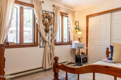 Wake up to the sounds of nature, unwind by the fire, and take in on The Hideout Golf in Pennsylvania - for sale on GolfHomes.com, golf home, golf lot
