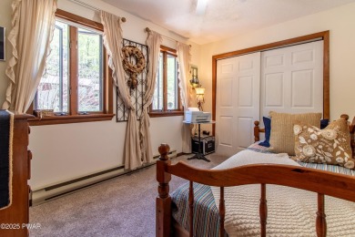 Wake up to the sounds of nature, unwind by the fire, and take in on The Hideout Golf in Pennsylvania - for sale on GolfHomes.com, golf home, golf lot