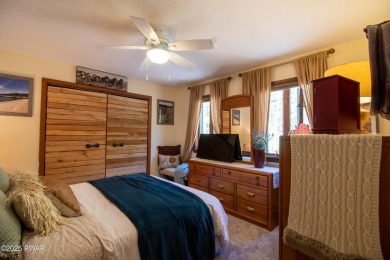 Wake up to the sounds of nature, unwind by the fire, and take in on The Hideout Golf in Pennsylvania - for sale on GolfHomes.com, golf home, golf lot