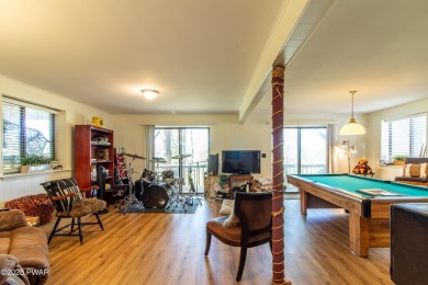 Wake up to the sounds of nature, unwind by the fire, and take in on The Hideout Golf in Pennsylvania - for sale on GolfHomes.com, golf home, golf lot
