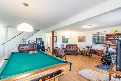 Wake up to the sounds of nature, unwind by the fire, and take in on The Hideout Golf in Pennsylvania - for sale on GolfHomes.com, golf home, golf lot