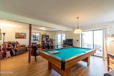 Wake up to the sounds of nature, unwind by the fire, and take in on The Hideout Golf in Pennsylvania - for sale on GolfHomes.com, golf home, golf lot