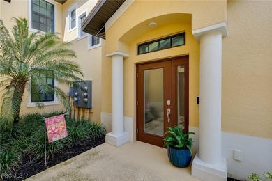 Arrive by PRIVATE ELEVATOR and step into a home that immediately on Pelican Preserve Golf Club in Florida - for sale on GolfHomes.com, golf home, golf lot