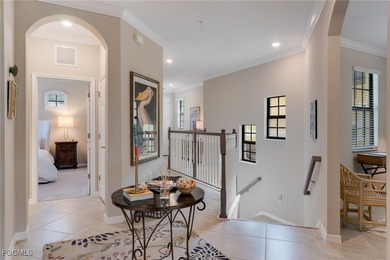 Arrive by PRIVATE ELEVATOR and step into a home that immediately on Pelican Preserve Golf Club in Florida - for sale on GolfHomes.com, golf home, golf lot