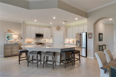 Arrive by PRIVATE ELEVATOR and step into a home that immediately on Pelican Preserve Golf Club in Florida - for sale on GolfHomes.com, golf home, golf lot