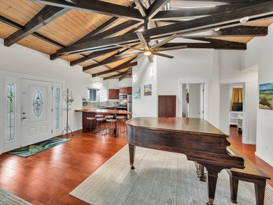 Tucked away on a quiet cul-de-sac, is a beautiful two story home on Discovery Harbour Golf Course in Hawaii - for sale on GolfHomes.com, golf home, golf lot