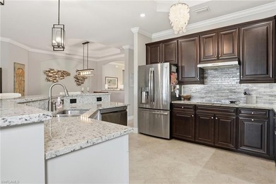 Experience elevated golf course living in this beautifully on Bonita National Golf Course in Florida - for sale on GolfHomes.com, golf home, golf lot