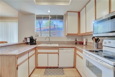 This 1,286 sqft corner-unit townhome is designed for both on Tustin Ranch Golf Club in California - for sale on GolfHomes.com, golf home, golf lot