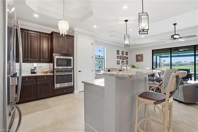 Experience elevated golf course living in this beautifully on Bonita National Golf Course in Florida - for sale on GolfHomes.com, golf home, golf lot