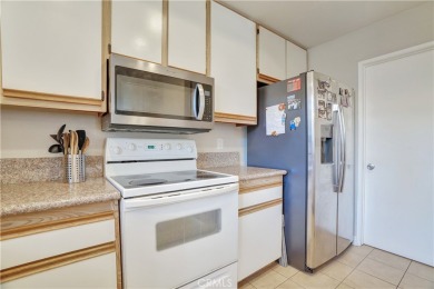 This 1,286 sqft corner-unit townhome is designed for both on Tustin Ranch Golf Club in California - for sale on GolfHomes.com, golf home, golf lot