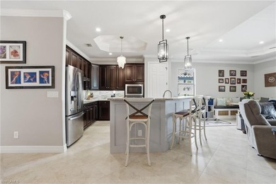 Experience elevated golf course living in this beautifully on Bonita National Golf Course in Florida - for sale on GolfHomes.com, golf home, golf lot