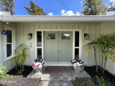 This beautiful home boasts a newer December 2024 roof and is in on Tomoka Oaks Golf and Country Club in Florida - for sale on GolfHomes.com, golf home, golf lot