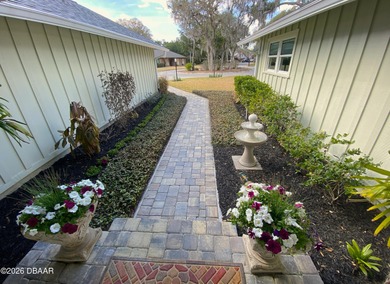 This beautiful home boasts a newer December 2024 roof and is in on Tomoka Oaks Golf and Country Club in Florida - for sale on GolfHomes.com, golf home, golf lot