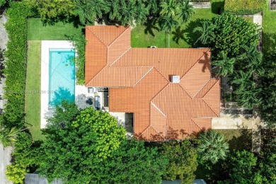 If you're seeking charm, a spacious backyard, and a prime on Miami Shores Country Club in Florida - for sale on GolfHomes.com, golf home, golf lot