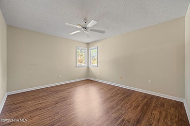 Welcome home to 101 Bunker Court, located in the highly on Belvedere Country Club in North Carolina - for sale on GolfHomes.com, golf home, golf lot