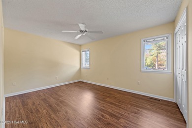 Welcome home to 101 Bunker Court, located in the highly on Belvedere Country Club in North Carolina - for sale on GolfHomes.com, golf home, golf lot