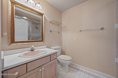 Welcome home to 101 Bunker Court, located in the highly on Belvedere Country Club in North Carolina - for sale on GolfHomes.com, golf home, golf lot