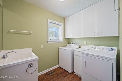 Welcome home to 101 Bunker Court, located in the highly on Belvedere Country Club in North Carolina - for sale on GolfHomes.com, golf home, golf lot