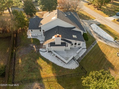 Welcome home to 101 Bunker Court, located in the highly on Belvedere Country Club in North Carolina - for sale on GolfHomes.com, golf home, golf lot