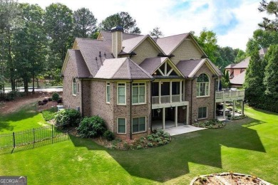 Welcome to this exceptional 3-sided brick and stone executive on Hamilton Mill Golf Club in Georgia - for sale on GolfHomes.com, golf home, golf lot