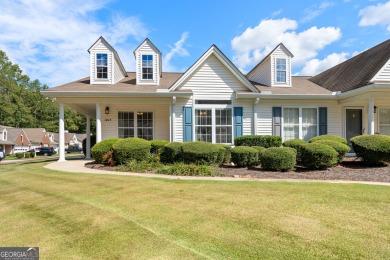 Welcome home to this charming 2-bedroom, 2-bath end-unit cottage on Braelinn Golf Club in Georgia - for sale on GolfHomes.com, golf home, golf lot