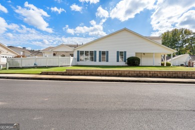 Welcome home to this charming 2-bedroom, 2-bath end-unit cottage on Braelinn Golf Club in Georgia - for sale on GolfHomes.com, golf home, golf lot