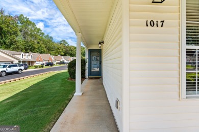 Welcome home to this charming 2-bedroom, 2-bath end-unit cottage on Braelinn Golf Club in Georgia - for sale on GolfHomes.com, golf home, golf lot