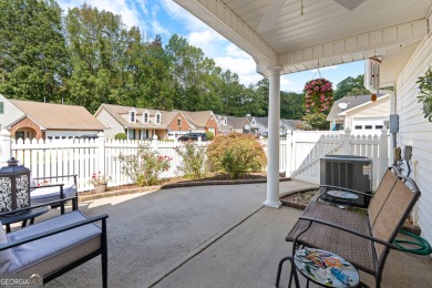 Welcome home to this charming 2-bedroom, 2-bath end-unit cottage on Braelinn Golf Club in Georgia - for sale on GolfHomes.com, golf home, golf lot