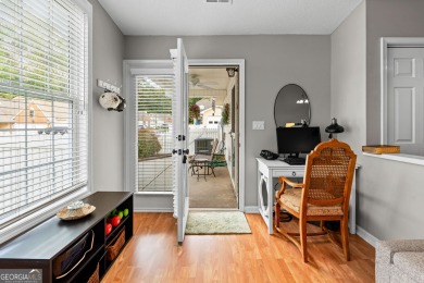 Welcome home to this charming 2-bedroom, 2-bath end-unit cottage on Braelinn Golf Club in Georgia - for sale on GolfHomes.com, golf home, golf lot