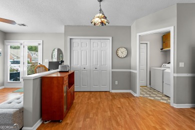 Welcome home to this charming 2-bedroom, 2-bath end-unit cottage on Braelinn Golf Club in Georgia - for sale on GolfHomes.com, golf home, golf lot