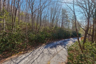 Discover an exceptional opportunity to build your mountain on Sapphire National Golf Club in North Carolina - for sale on GolfHomes.com, golf home, golf lot