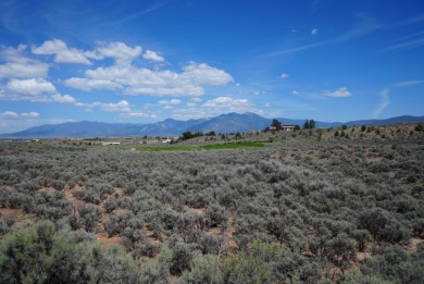 Discover the perfect blend of natural beauty and luxury living on Taos Country Club in New Mexico - for sale on GolfHomes.com, golf home, golf lot