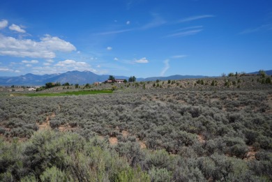 Discover the perfect blend of natural beauty and luxury living on Taos Country Club in New Mexico - for sale on GolfHomes.com, golf home, golf lot