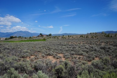 Discover the perfect blend of natural beauty and luxury living on Taos Country Club in New Mexico - for sale on GolfHomes.com, golf home, golf lot