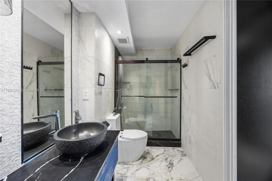 Completely redesigned & fully renovated high-floor 2/2 residence on Turnberry Isle Resort and Club in Florida - for sale on GolfHomes.com, golf home, golf lot