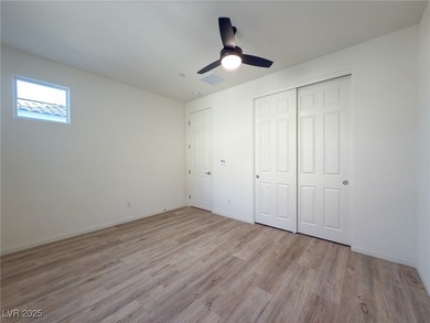 Discover elevated living in this stunning townhome nestled in on Reflection Bay Golf Club in Nevada - for sale on GolfHomes.com, golf home, golf lot