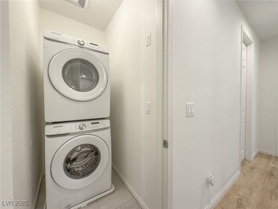 Discover elevated living in this stunning townhome nestled in on Reflection Bay Golf Club in Nevada - for sale on GolfHomes.com, golf home, golf lot