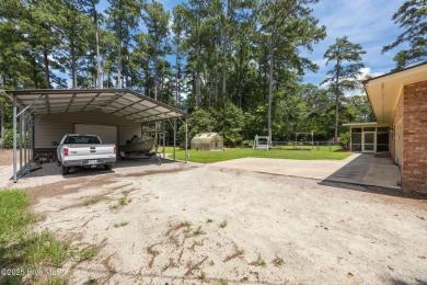 Check out this 3 bedroom 2 bathroom brick home located in on Washington Yacht and Country Club in North Carolina - for sale on GolfHomes.com, golf home, golf lot