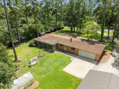 Check out this 3 bedroom 2 bathroom brick home located in on Washington Yacht and Country Club in North Carolina - for sale on GolfHomes.com, golf home, golf lot