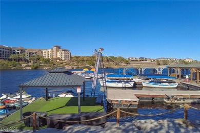 Discover elevated living in this stunning townhome nestled in on Reflection Bay Golf Club in Nevada - for sale on GolfHomes.com, golf home, golf lot