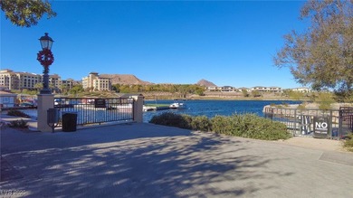 Discover elevated living in this stunning townhome nestled in on Reflection Bay Golf Club in Nevada - for sale on GolfHomes.com, golf home, golf lot