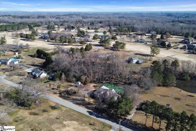 Step into timeless elegance with this custom built on Carolina Springs Golf Club in South Carolina - for sale on GolfHomes.com, golf home, golf lot