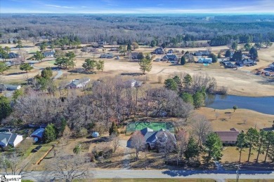 Step into timeless elegance with this custom built on Carolina Springs Golf Club in South Carolina - for sale on GolfHomes.com, golf home, golf lot