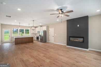 This modern farmhouse ranch-style home is situated right on the on Cabin Creek Golf Club in Georgia - for sale on GolfHomes.com, golf home, golf lot