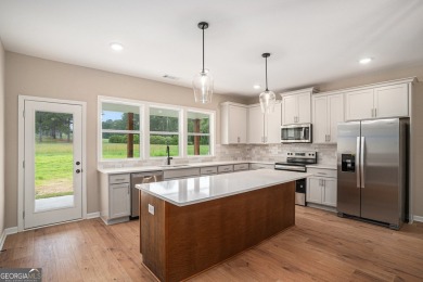This modern farmhouse ranch-style home is situated right on the on Cabin Creek Golf Club in Georgia - for sale on GolfHomes.com, golf home, golf lot