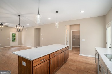 This modern farmhouse ranch-style home is situated right on the on Cabin Creek Golf Club in Georgia - for sale on GolfHomes.com, golf home, golf lot