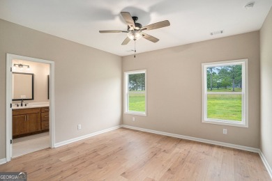 This modern farmhouse ranch-style home is situated right on the on Cabin Creek Golf Club in Georgia - for sale on GolfHomes.com, golf home, golf lot