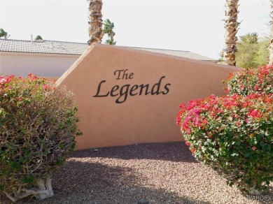 Located in the gated community of Legends that offers clubhouse on Laughlin Ranch Golf Club in Arizona - for sale on GolfHomes.com, golf home, golf lot